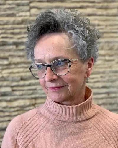 short curly hair for 70-year-olds with glasses