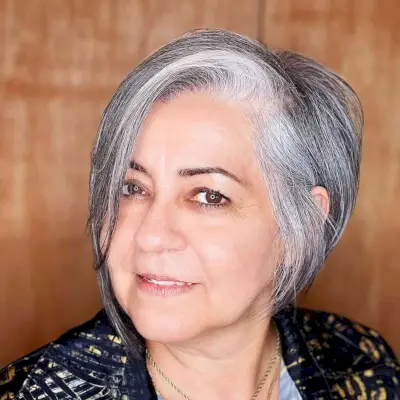 Asymmetrical Bob with a Side Part for Fine-Haired Fifty-Year-Olds