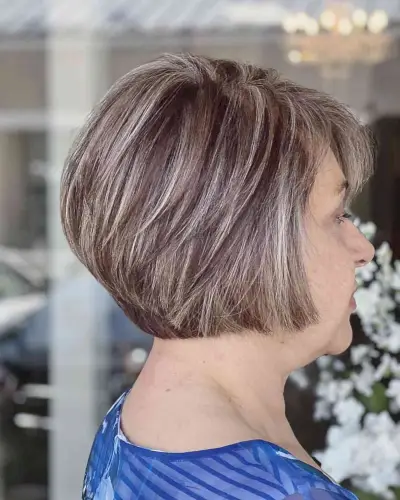 Low-Maintenance Short Stacked Bob with Wispy Layers for 50-Year-Olds