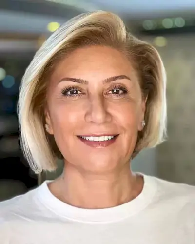 Short Asymmetric and Side Parted Blonde Bob for Ladies Aged Fifty