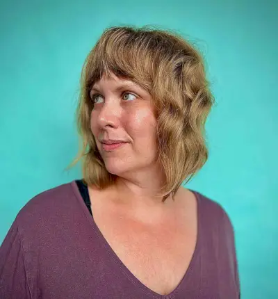 Shagged Long Bob with Heavy Bangs on Women Aged Forty