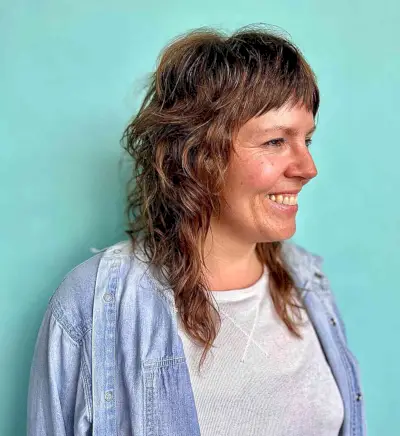 Mid-Length Textured Shag with Short Bangs for Women Over 40