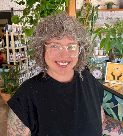 Short Grey Shaggy French Bob with Bangs for Older Women Above 40 with Glasses