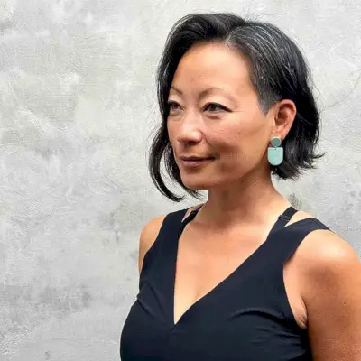 Edgy Asymmetrical Bob with Soft Waves for forty-year-olds