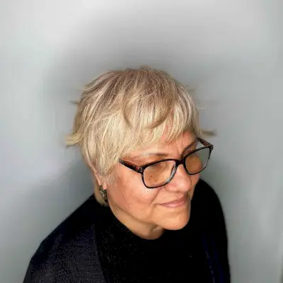 Feathered Bangs on Layered Pixie for Ladies Over 50 with Fine Hair