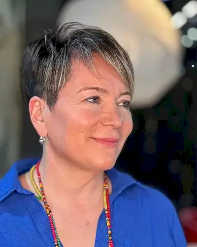 Chic Pixie Cut with Natural Highlights for 50-Year-Olds with Thin Hair