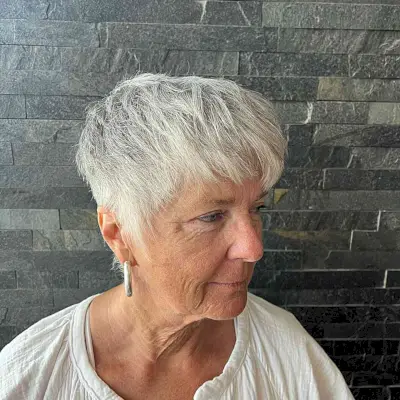 Silver Gray Wispy Pixie Cut for 60-Year-Olds with short hair