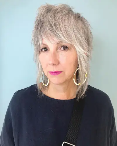 Youthful Shaggy Lob haircut for ladies over 50 with thin hair