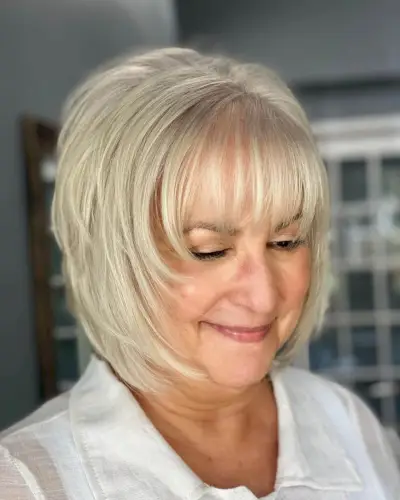  silver shaggy bob with bangs for fine haird ladies over 50