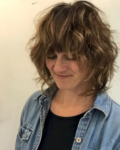 messy beach wave for 50 year old women with thick hair