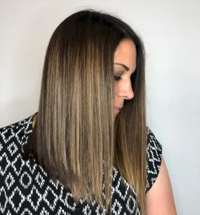 straight long bob for woman over 50 years old with thick hair