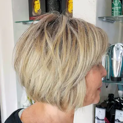 Layered Blonde Graduated Bob with a Fringe for Women Over Fifty