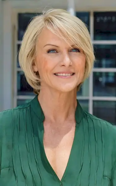 Blonde Layers and a Sweeping Fringe on a Bob Cut