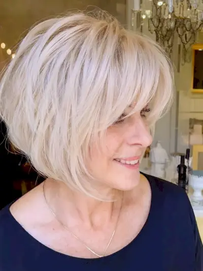 Soft platinum bob with visible layers for ladies aged fifty