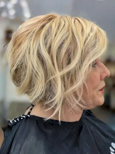 Stacked and layered blonde bob for 50-year-old ladies