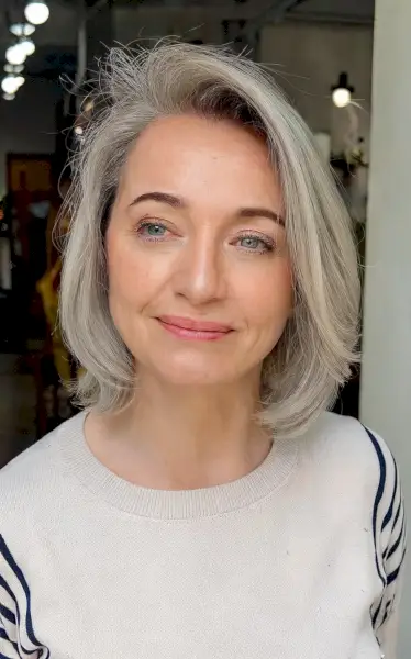 Gray Layered Bob with a Side Part for 50-Year-Olds