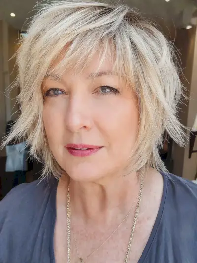 Layered bob with bangs for round faces