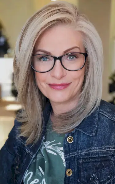 Medium-length bob with layers for older women with glasses