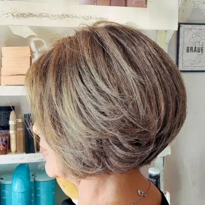 Short-Length Rounded Wedge Layered Bob Cut for Ladies Aged 50
