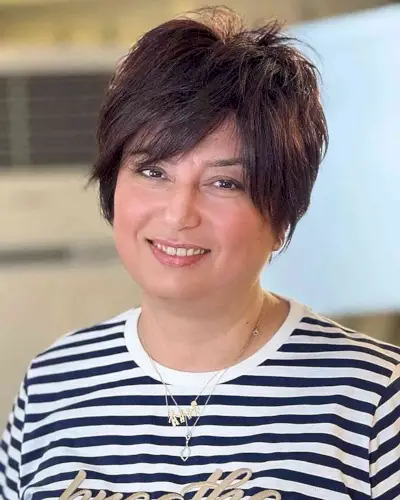 Pixie with a Side Part and Bangs foror women over 40