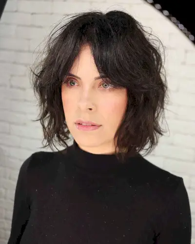 black shaggy cut with no bangs