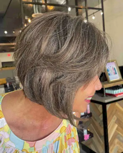 Youthful Inverted Bob with Feathery Layers for an Older Lady