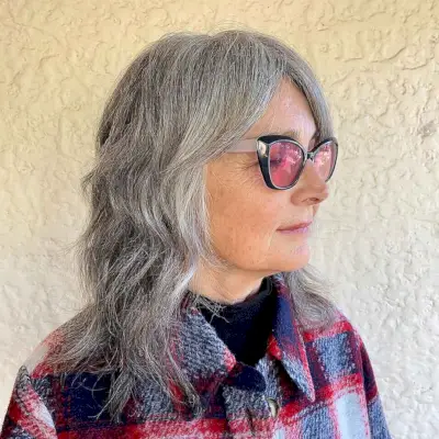 Grey shaggy mid-length haircuts are very trendy for women of all ages. If you