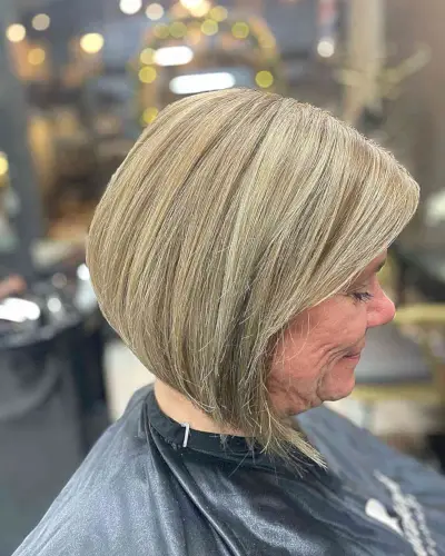 Dimensional Blonde for a Neck-Length Slanted Bob on Senior Women Aged 50