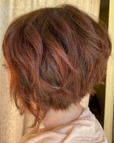 Auburn bob with layers for volume for women 50+