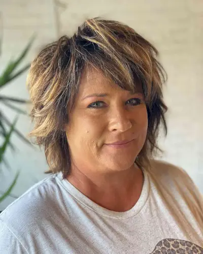 highlights on short hair with longer bangs for women over fifty