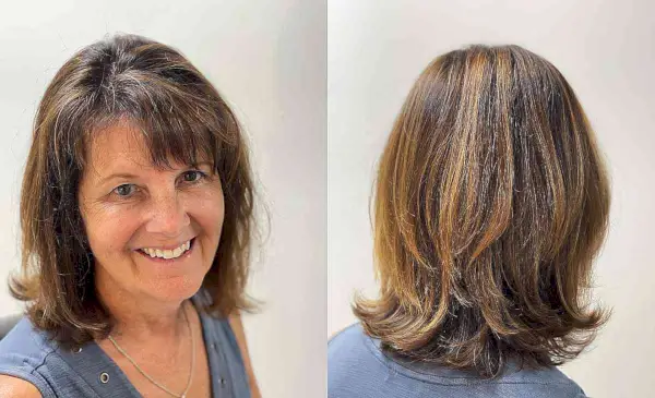 Sun-Kissed Medium Layered Cut with Side Bangs for Ladies Over 50