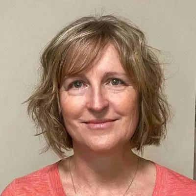 Short Honey Blonde Hair with Tousled Layers for 50-Year-Old Women