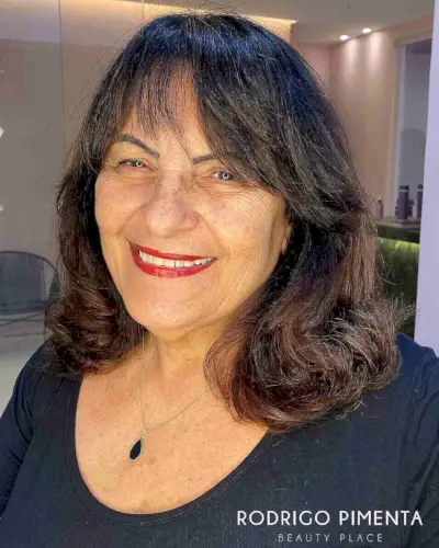 Airy Medium-Length Hair with Soft Bangs for Women Over Fifty