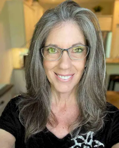 Medium to Long Layered Cut on Grey-Haired Women Over Fifty