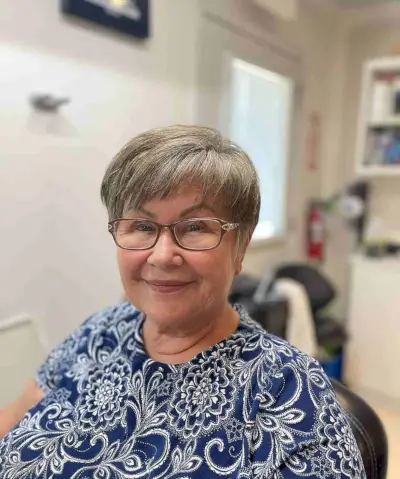Short Gray Hair with Micro Bangs for a Woman in Her 50s