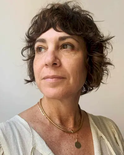 Short shaggy bob with curtain bangs