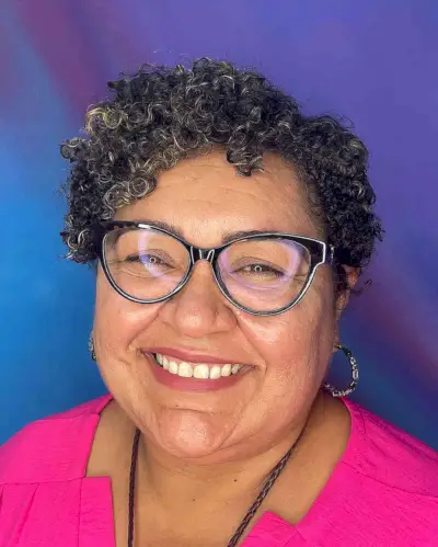 Cute Short Ringlets for 50-Year-Olds with Glasses