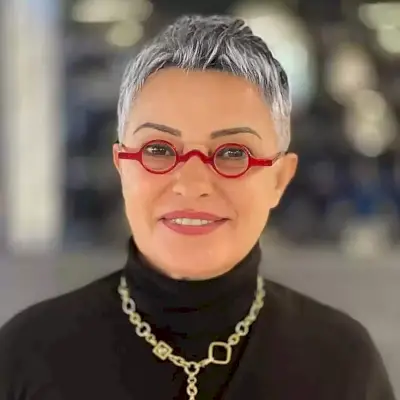 Silver Balayage on a Very Short Cut for 50-year-olds with Glasses