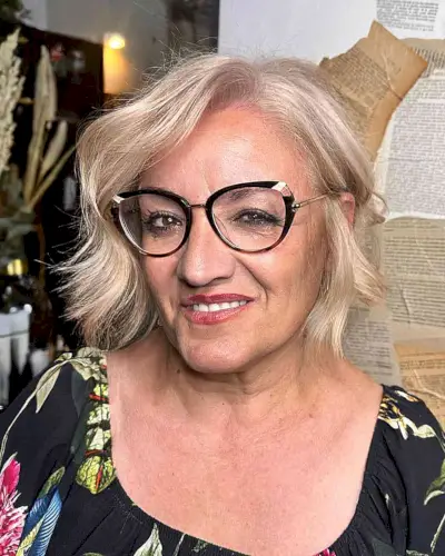 Messy Deeply Side-Parted Bob Cut for Ladies Aged 50 with Glasses