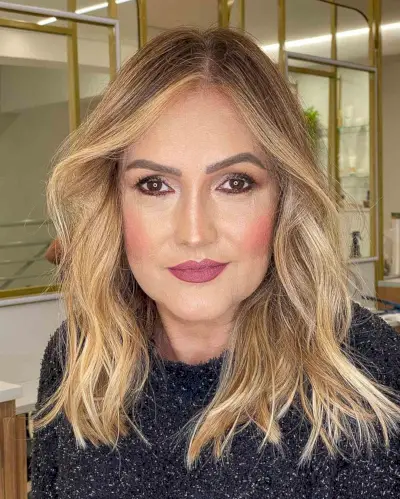 Mid-Length Cut with an Off-Center Part for Ladies 50 and Up