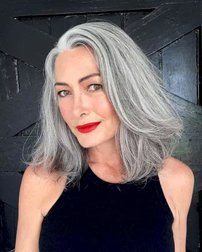 Softly Layered Silver Long Bob for a Lady Over 50