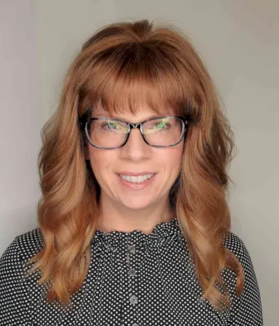 layers for women over 50 with glasses