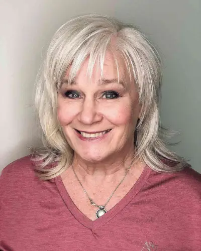 Shoulder-Length Shaggy Bob with Wispy Bangs