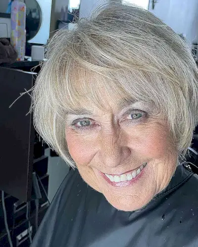 Short Bob with Bangs and Soft Blonde Tones for 60-year-olds