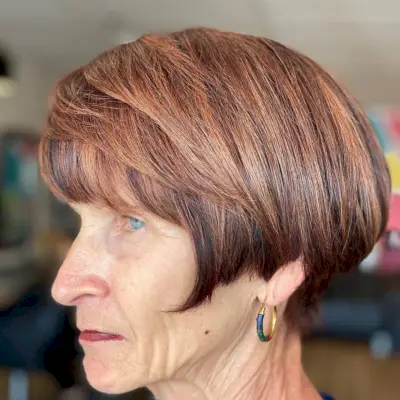Ear-Length Layered Bob on a Copper Brown Hair Color