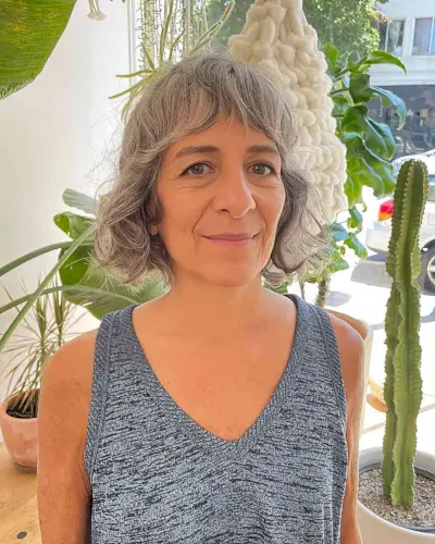 Short Shaggy Pixie Bob with Bangs for Women Over 60 with Grey Thick Hair