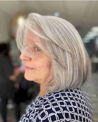 Bob with Side Bangs and Salt-and-Pepper Hair Color for 70-Year-Olds