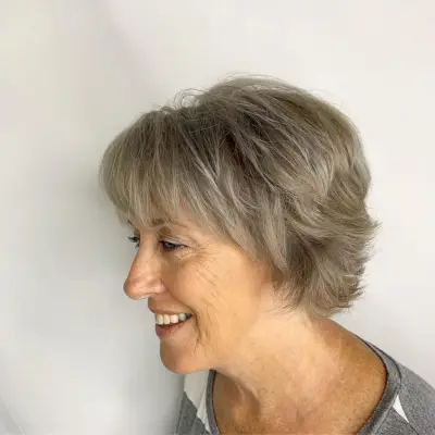 Casual textured short bob haircut for woman over 70 