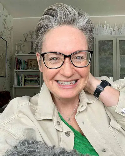 Voluminous Quiff Style for Short Pixie for ladies over 60 wearing glasses