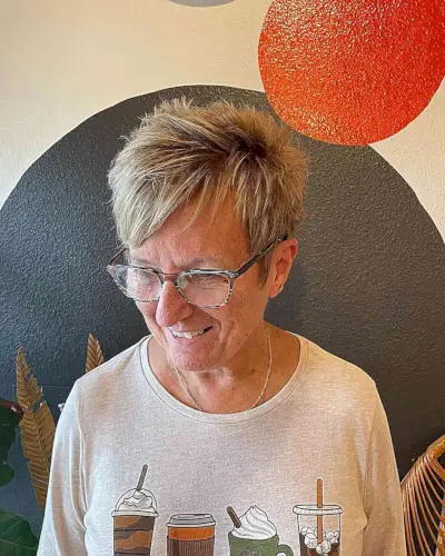 Spiky Edgy Short Pixie Hair with Side Fringe for 60-year-old Women with Glasses